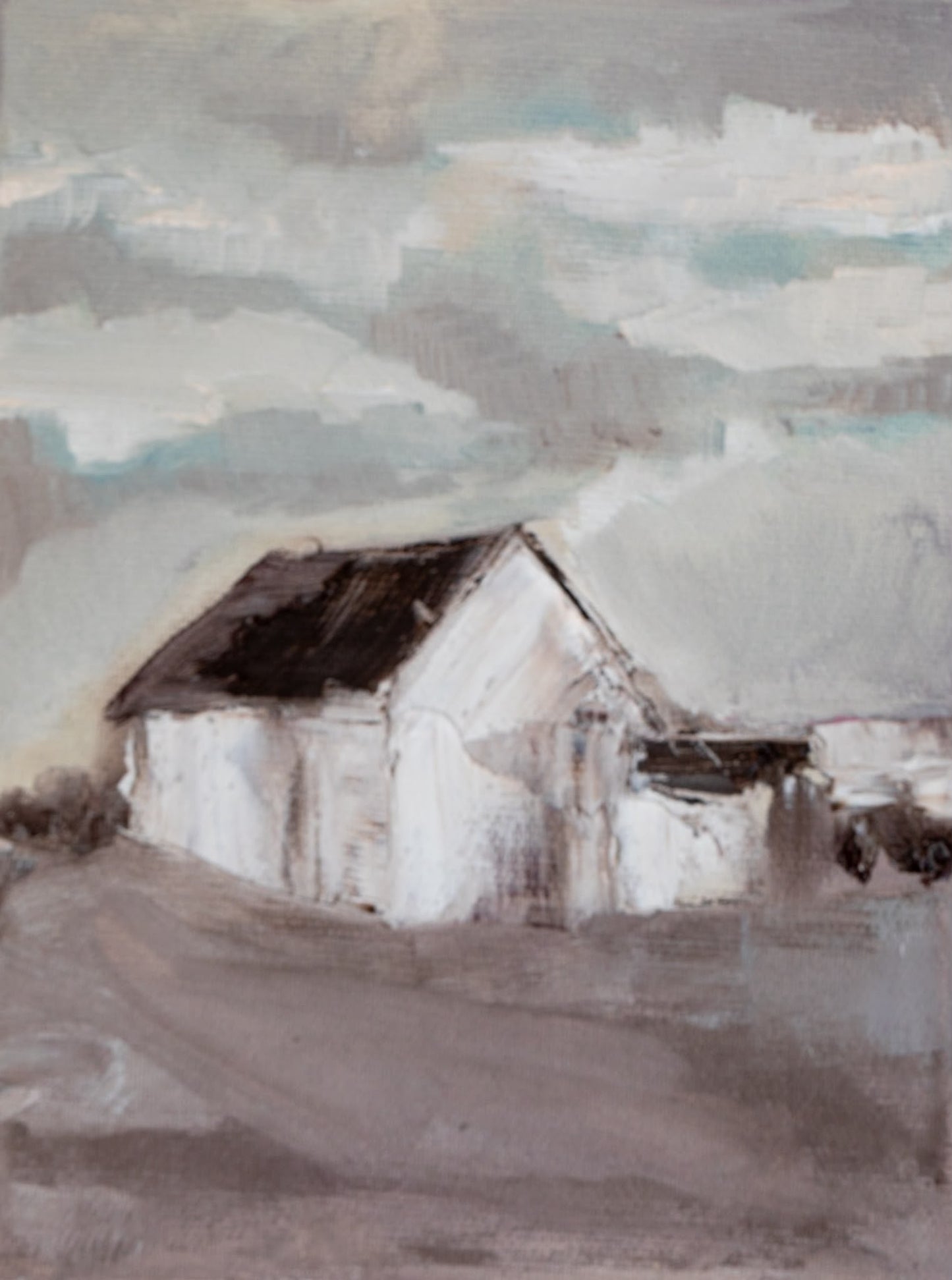 Original oil painting of a white barn with a dark roof under moody grey clouds from the Home series by Tamar Green