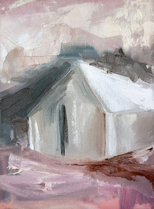 Original oil painting of a cream house with a blue mountain behind it against a soft pink landscape from the Home series by Tamar Green
