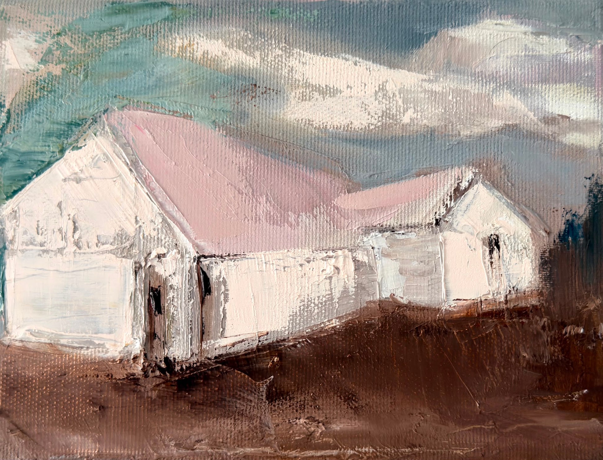 Original oil painting of white houses with a pink roof above rich brown earth from the Home series by Tamar Green